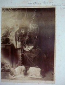Dot seated holding rabbitt in Paris Studio 1888 pixel sized
